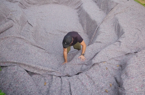 poser un geotextile de bassin